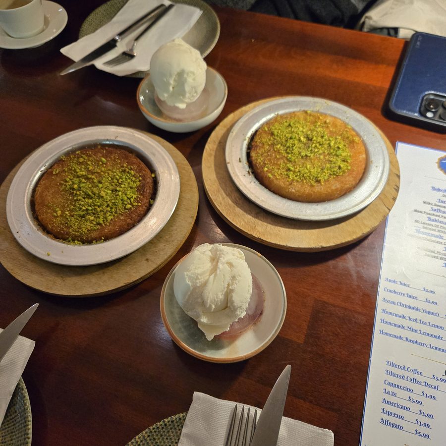Two desserts with pistachio and ice cream