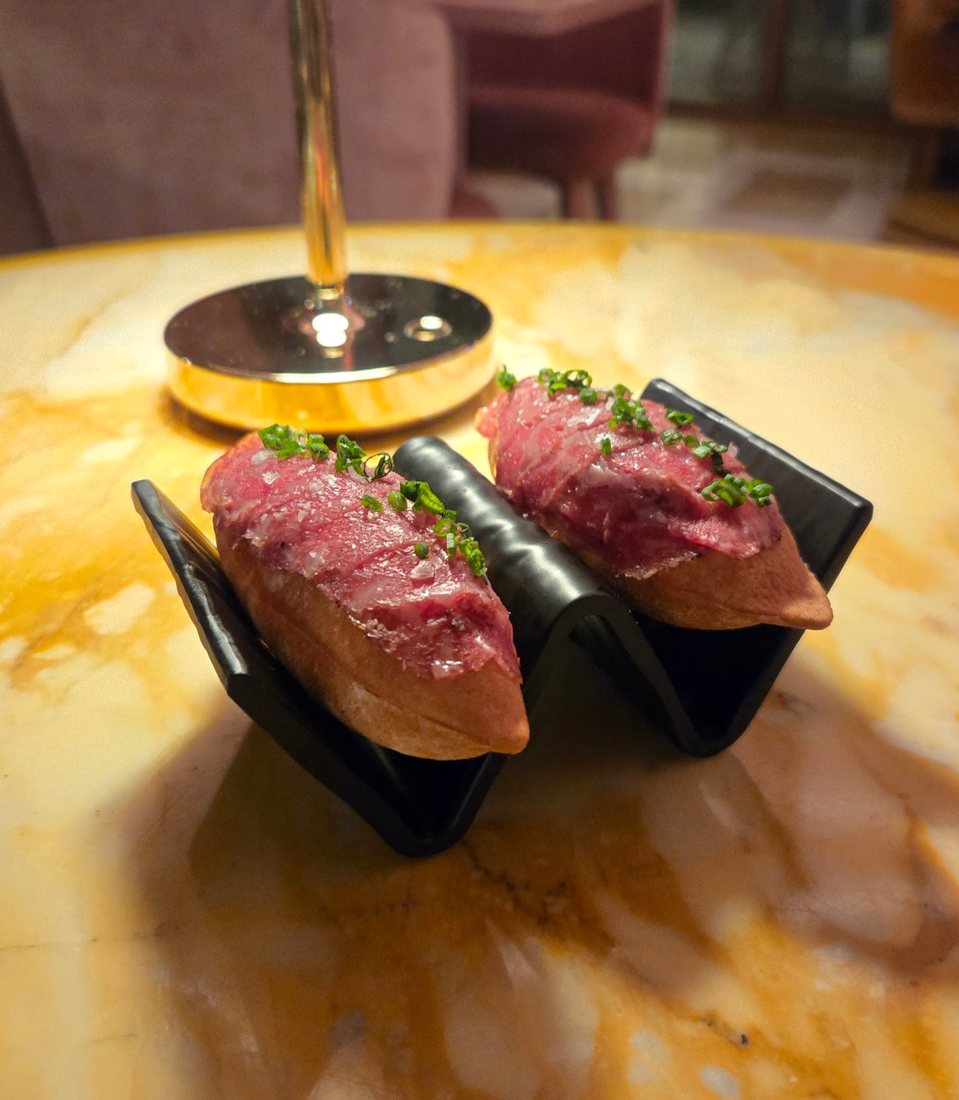 Seared beef bites on small boards