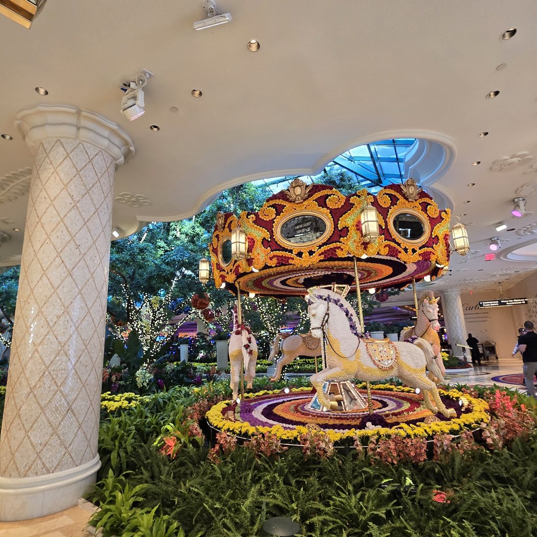A giant floral carousel inside Wynn