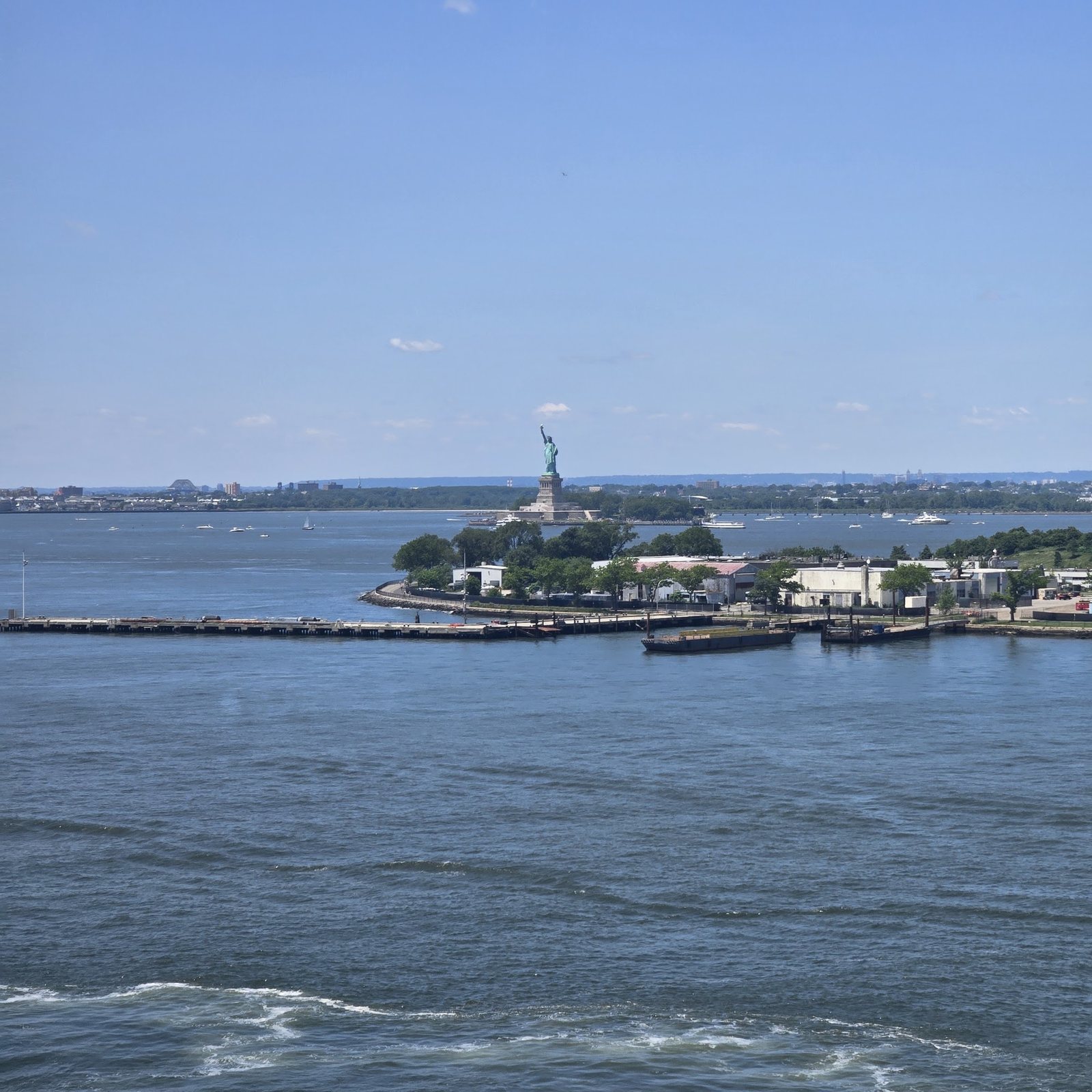 The Statue of Liberty from the ship as it leaves New York