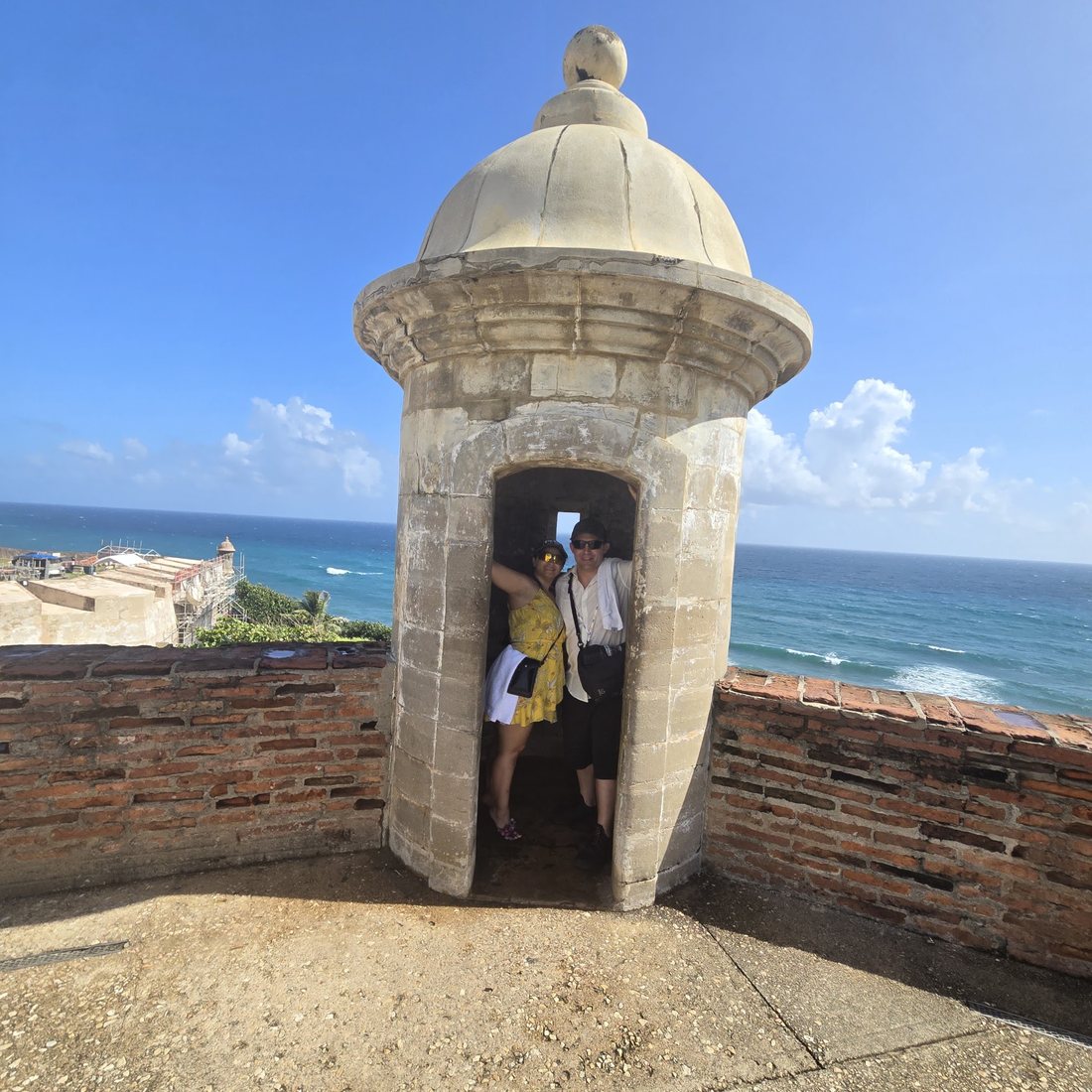 Nick and Nagham in a sentry box at El Morro